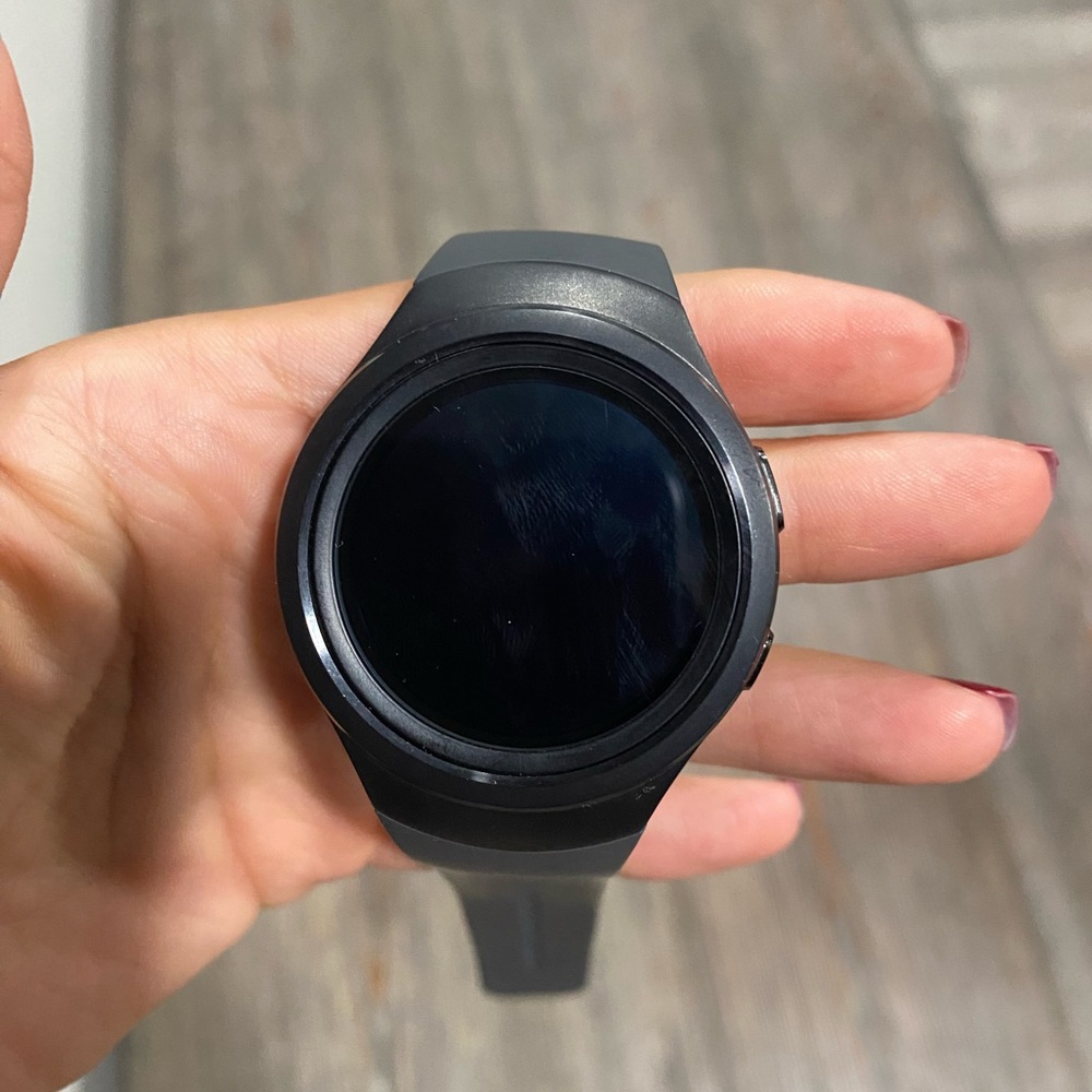 Samsung Black Smartwatch with Sleek Design and Round Display